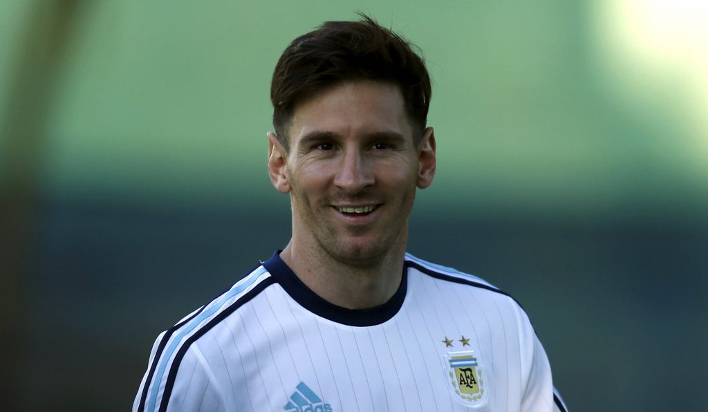 Argentina's Lionel Messi smiles during a training session in La Serena, June 9, 2015. Argentina will play the group B matches along with Paraguay, Uruguay and Jamaica in the upcoming Copa America 2015 soccer tournament in Chile. REUTERS/Marcos Brindicci