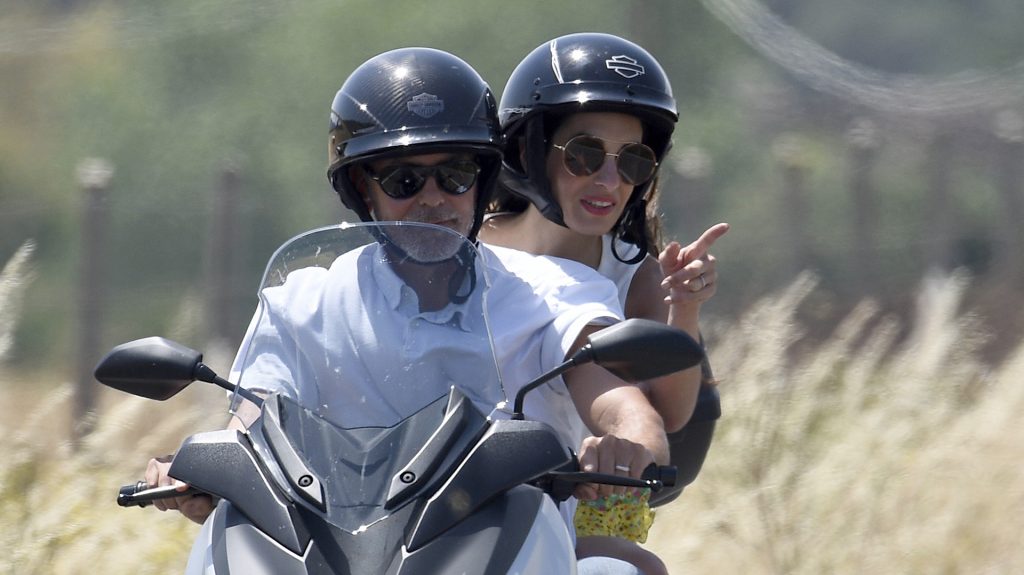 Photo ¬© 2018 Ciao Pix/The Grosby Group Spain: Lagencia Grosby EXCLUSIVE Sardinia, Italy, 4 JUNE, 2018. George Clooney and wife Amal taking a spin on a scooter around Sardinia, Italy.